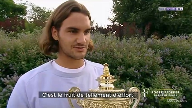 Roger Federer, après son premier titre à Wimbledon en 2003. Coupe de beau gosse.