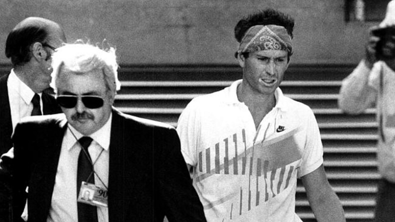 John McEnroe est disqualifié en huitièmes de finale de l'Open d'Australie 1990. (News Limited)